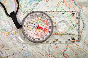 The concept of navigation in the area. Map and compass