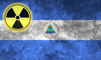 Fototapeta premium Grunge flag background with nuclear sign - Nicaragua