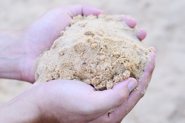 Fototapeta na wymiar Soil sand on hand for construction concrete mixing