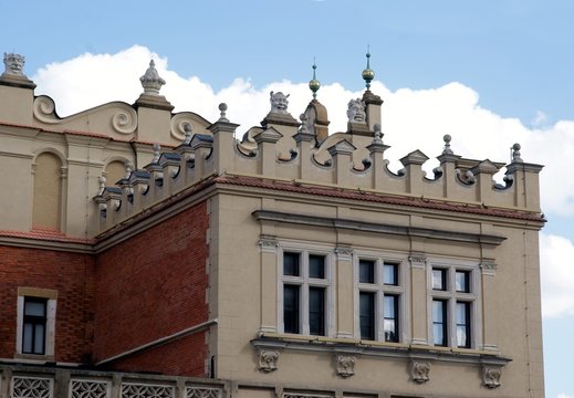 fragment of Cloth Hall building with mascarons