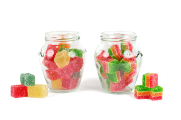 Fototapeta na wymiar Glass jars filled with different colorful jelly