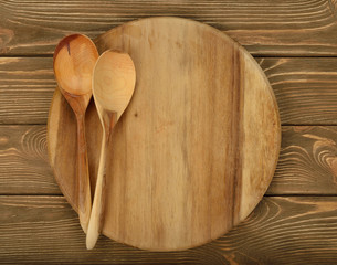 Round board and wooden spoons