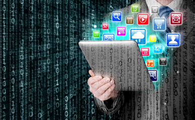 Business man use tablet pc with colorful application icons