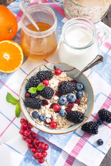 Healthy breakfast with granola and fresh berries