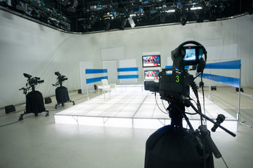 Television studio with camera and lights