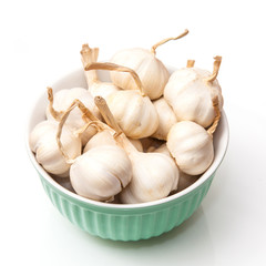 Garlic bulbs on a white background.