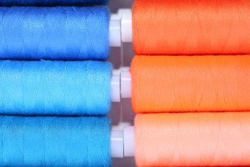 Multicolor sewing threads background