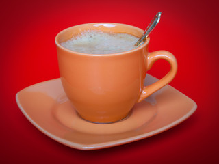 A cup of coffee on red background