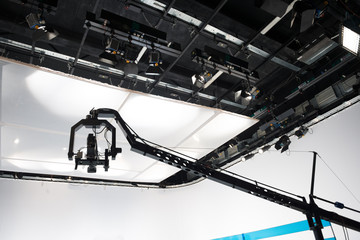 Television studio with jib camera and lights