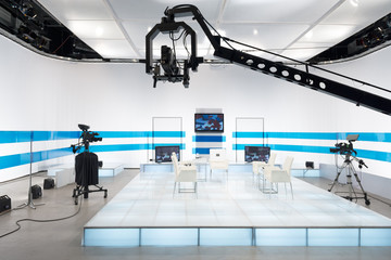 Television studio with jib camera and lights - obrazy, fototapety, plakaty