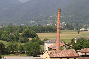 Old brick chimney of an old factory