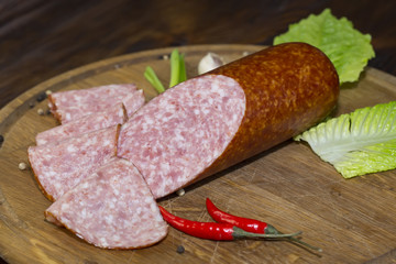 sausage on a wooden plate in a restaurant