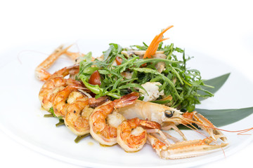 shrimp salad greens vegetables and crayfish in the restaurant