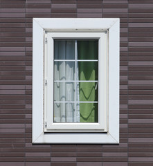 modern window with brick wal