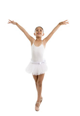 young little cute ballet dancer girl dancing on white background