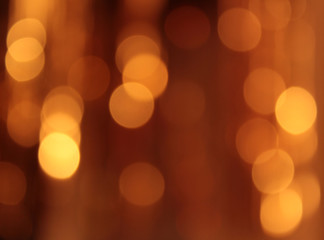 Festive gold background with bokeh effect