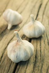 Organic garlic on wood
