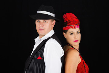 Dangerous standing bonny and clyde gangsters with 1920 clothes s