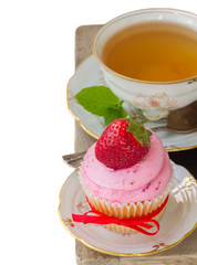 cupcake with strawberry on white