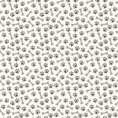 Animal seamless vector pattern of paw footprint and bone. Endles - 65163563