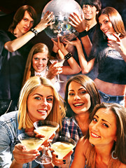 Woman on disco in night club.