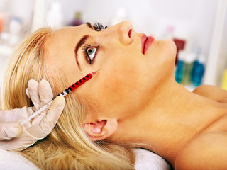 Woman receiving cosmetic injection