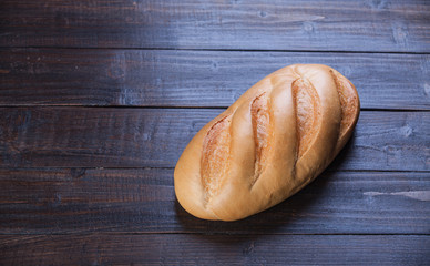 Delicious bread on a wood table