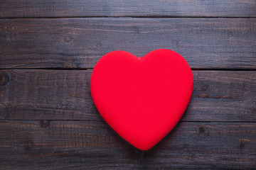 Heart shape on wooden table.