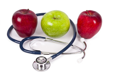 apples with stethoscope concept of healthy diet