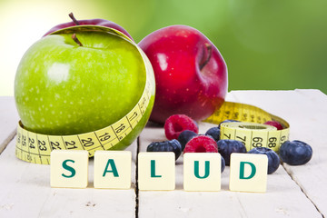 fresh fruit with measuring cintra concept of healthy diet
