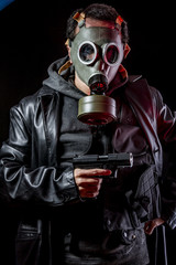 Private detective with bulletproof vest and gas mask