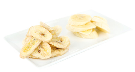 Fresh and dried banana slices, isolated on white