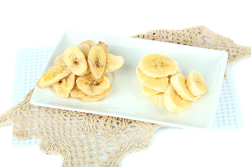 Fresh and dried banana slices, isolated on white
