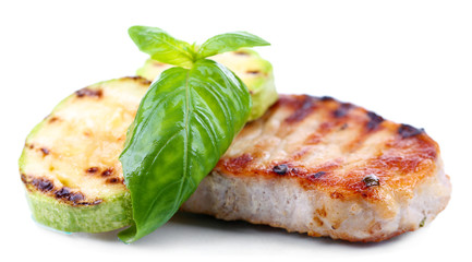 Grilled steak and grilled vegetables isolated on white