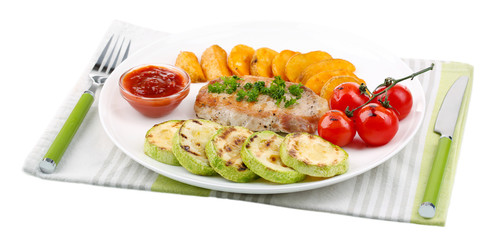Grilled steak and grilled vegetables on plate, isolated on