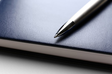 Pen on book, close up