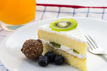 delicious slice of   cake on white plate