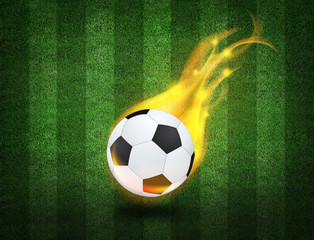 fiery soccer ball on playing field of stadium 