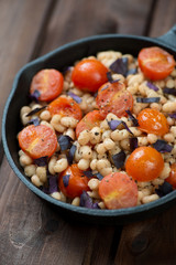 Roasted white beans, cherry tomatoes and chopped purple basil