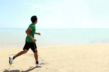 Papier Peint photo Lavable Jogging Man running on the beach