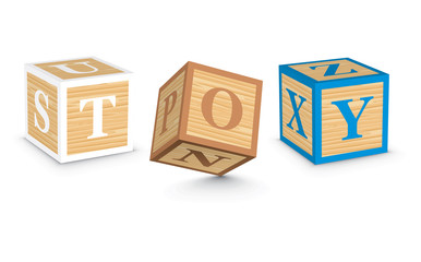 Word TOY written with alphabet blocks
