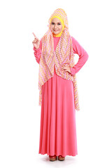 beautiful woman wearing pink muslim dress pointing