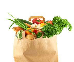 Multiple different vegetables in paper bag
