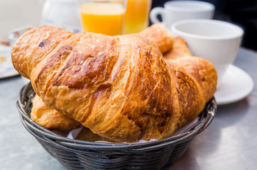 Breakfast with coffee in a basket