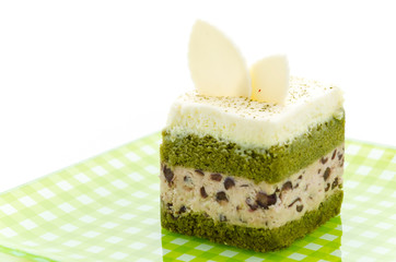 Obraz na płótnie Canvas Matcha green tea cake isolated on white background