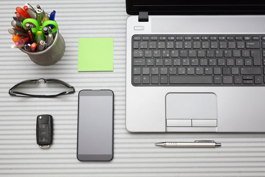 modern office desk with working accessories, top view
