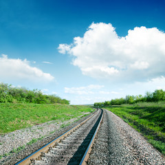 Fototapeta premium white clouds over railroad
