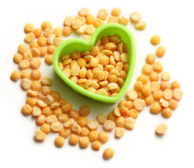 Heap of peas and heart form
