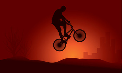 Obraz premium Bmx rider jump silhouette