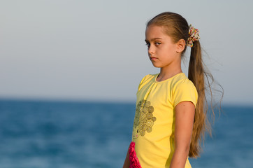 portrait of a beautiful girl at sunset.